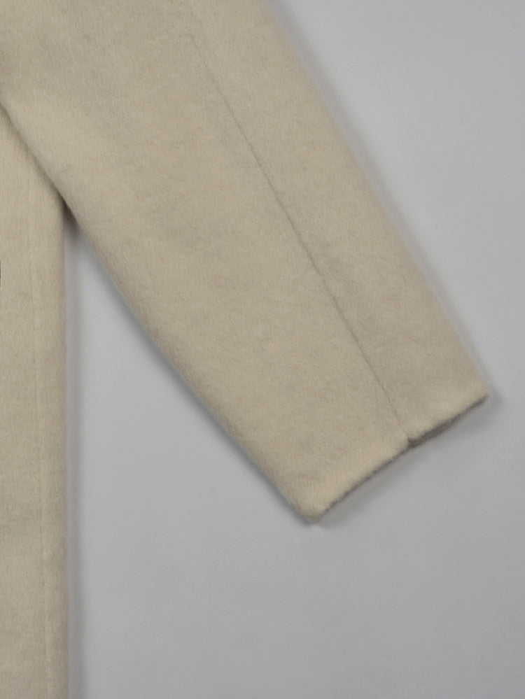 Wool coat with Lotus Bloom Clasp