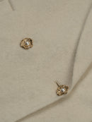 Wool coat with Lotus Bloom Clasp