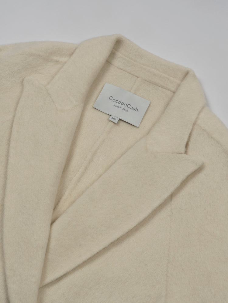 Wool coat with Lotus Bloom Clasp