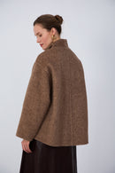 Eastern-inspired luxury hand-finished wool coat