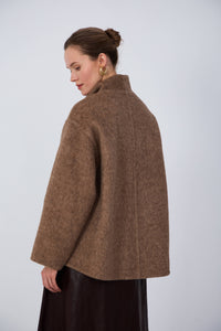 Eastern-inspired luxury hand-finished wool coat