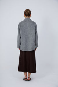 Eastern-inspired luxury hand-finished wool coat with silk lining