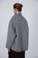 Hand-finished double-breasted silk-lined coat