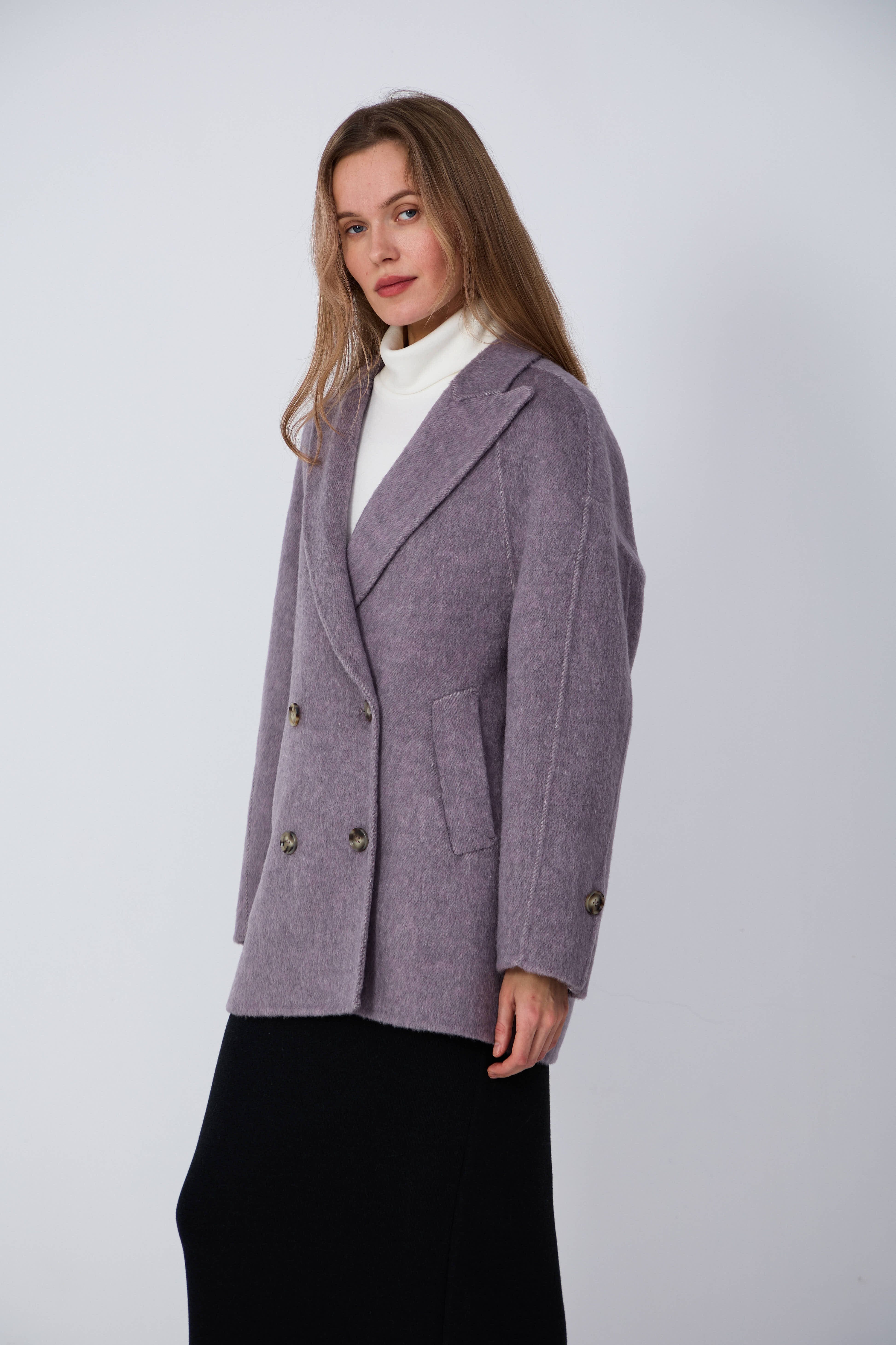 Hand-finished long wool coats