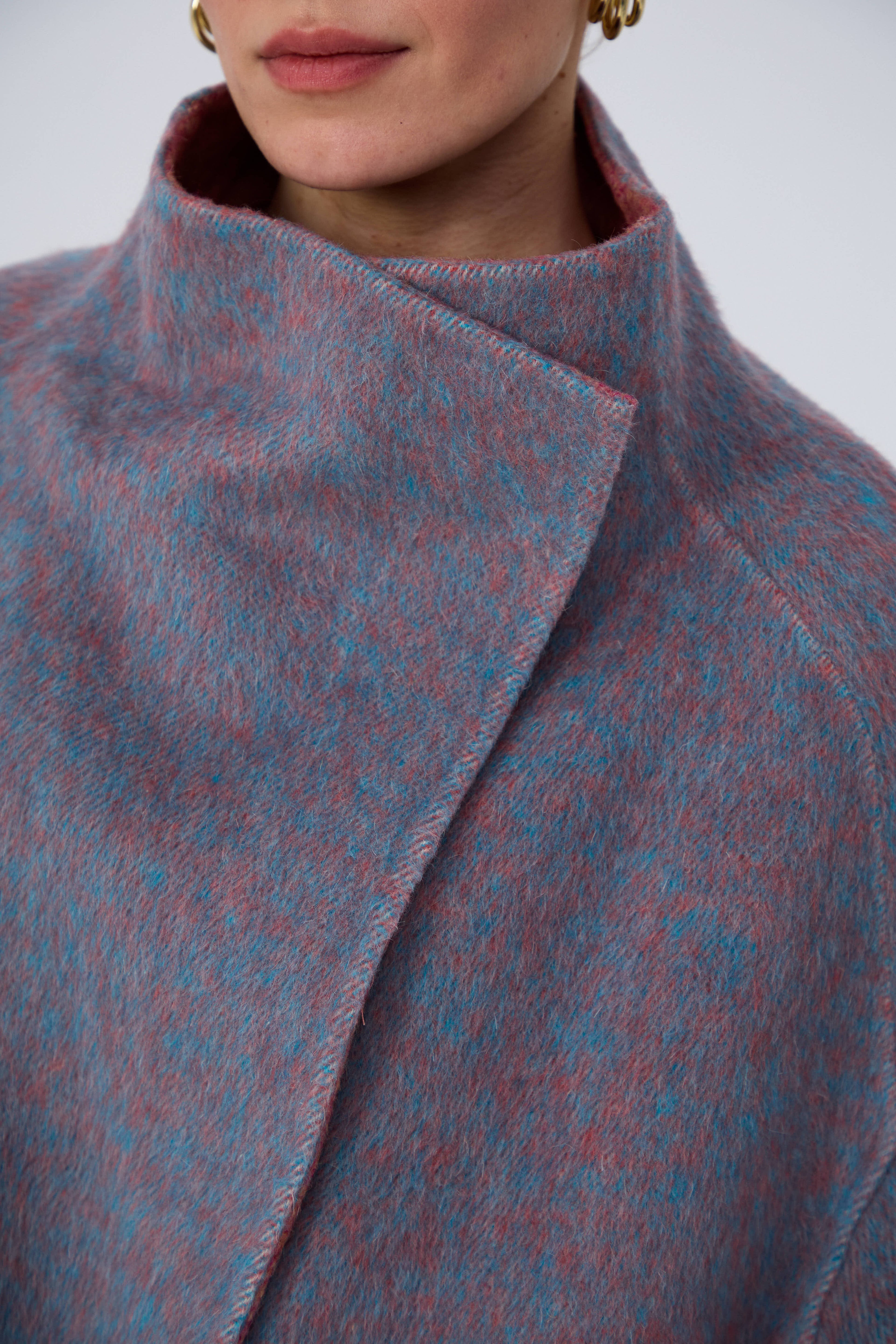 Sophisticated hand-finished long wool coat