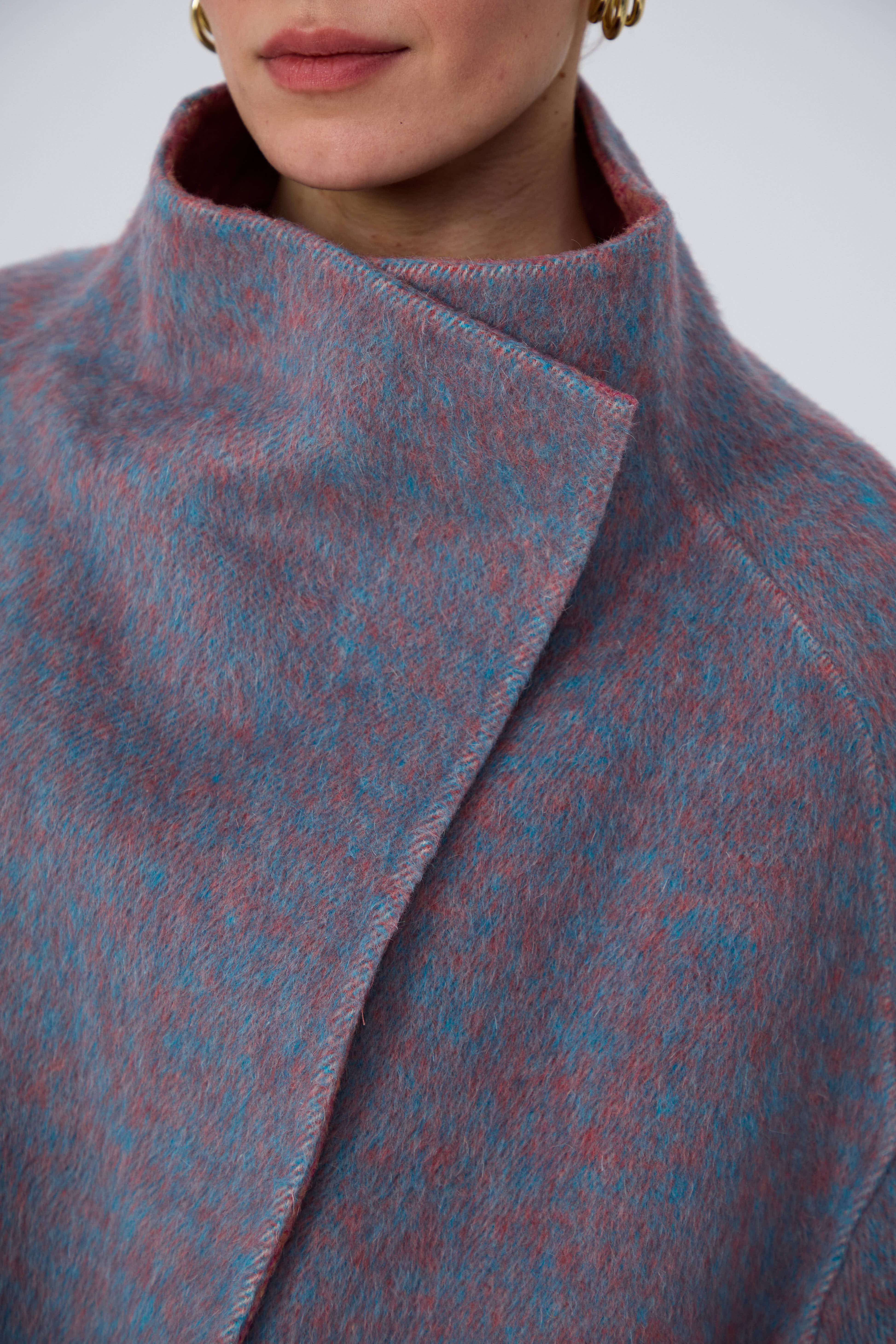Sophisticated hand-finished long wool coat