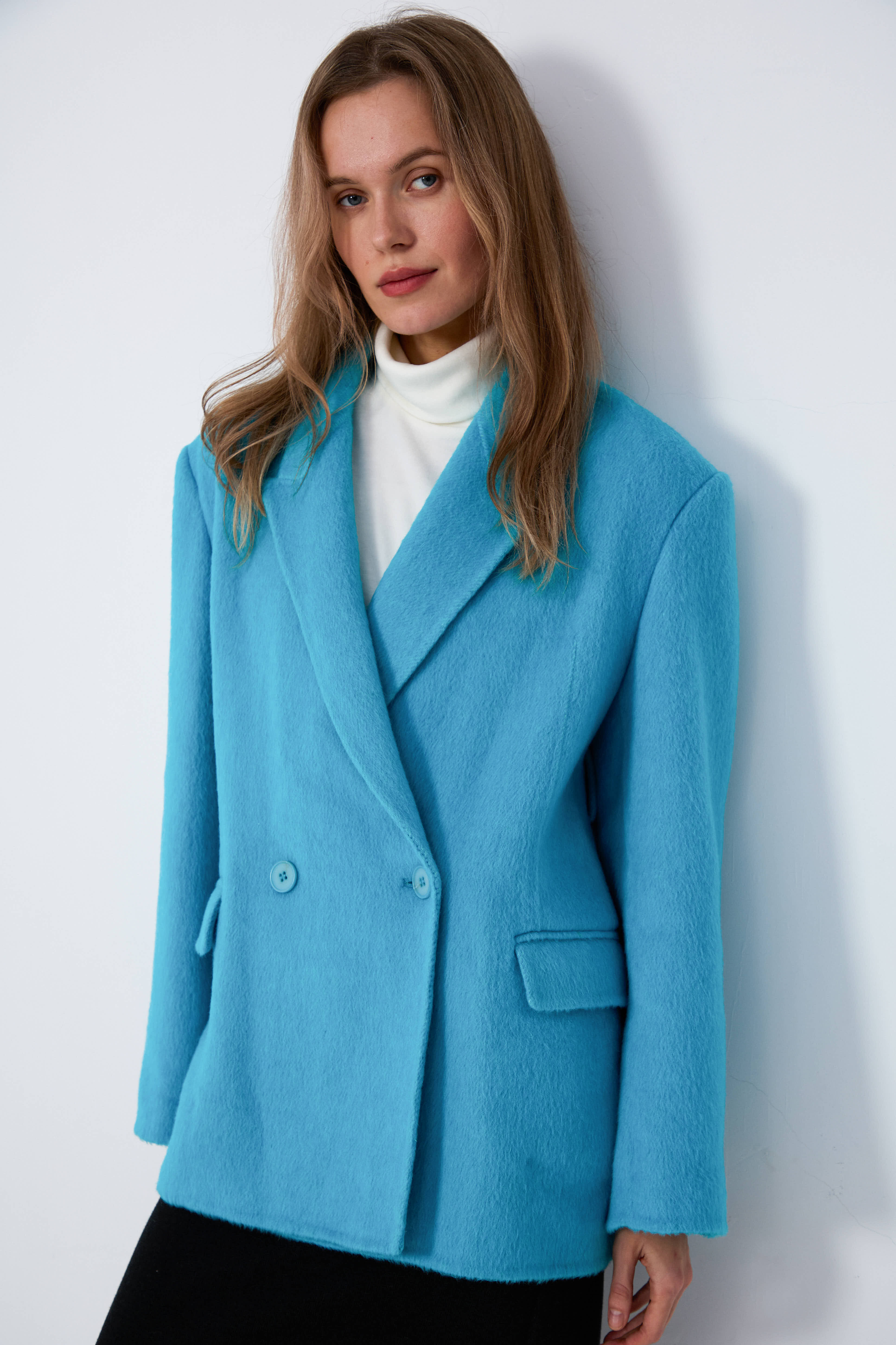 precision-finished wool coats
